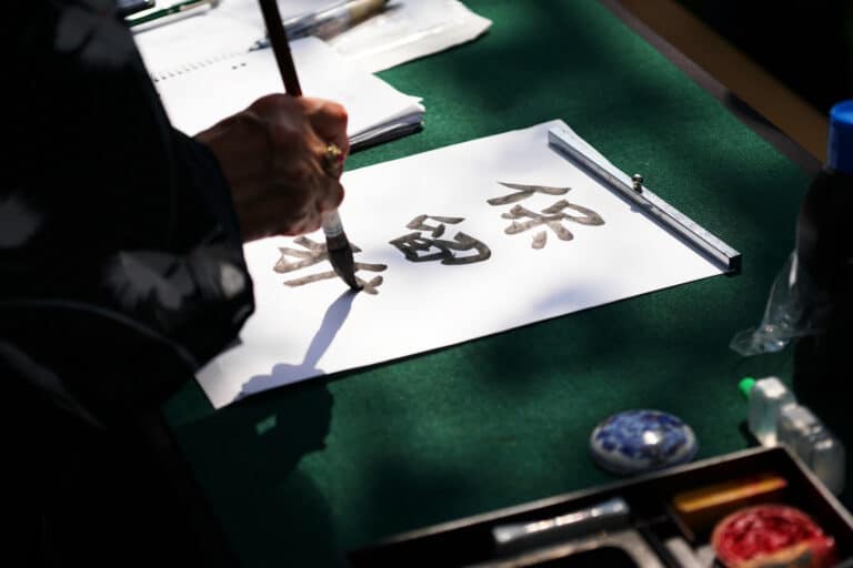 japanese calligraphy with ink brush on paper